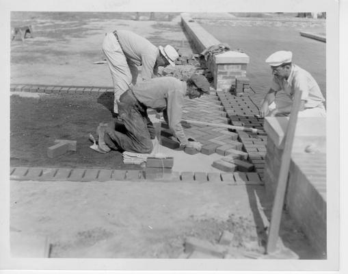 WPA workers laying brick sidewalk at Algonquin Park Playground