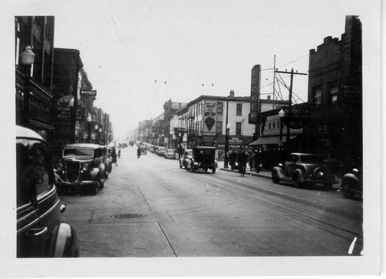 Madison Avenue, the busiest street in Covington, paved with concrete without stopping traffic