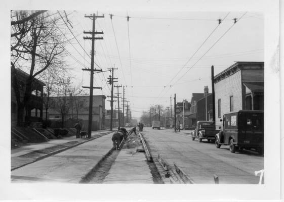 WPA workers removing street car rails in Covington