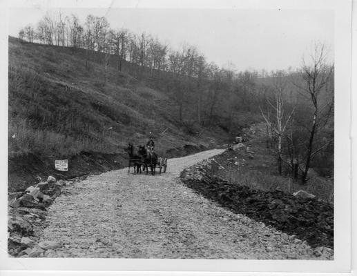 Man with wagon and team on graded Blaine Road