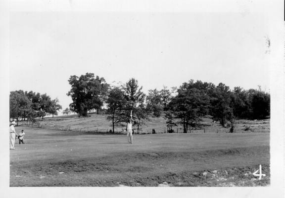 Dedication of Noble Park Golf Course, May 16, 1940. Putting on #10 Green. Goodman Hill in background