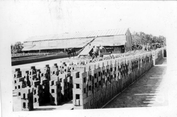 Bricks pressed and burned by WPA workers for Gamaliel High School construction project. Over 360,000 bricks were pressed and burned and later used for the project