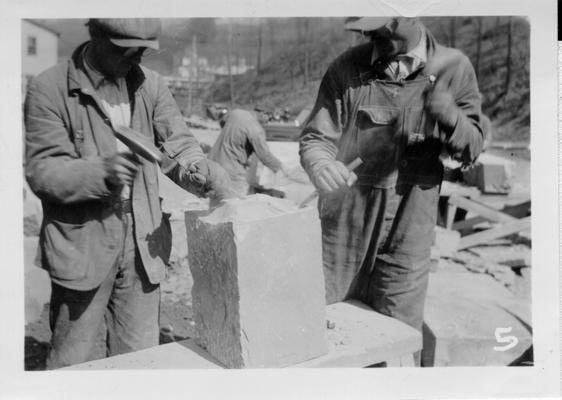 WPA workers shaping building stone