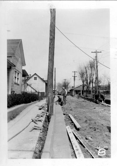 Corbin street and curb under construction by the WPA