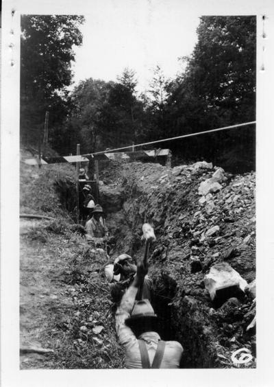 Project # 2-1-604-2804 City of Columbia Sewers. View of project showing men digging a ditch for sewer