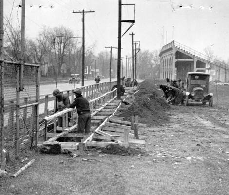 Project #1284 District 3: Improvements for the athletic field of the University of Kentucky, Lexington, KY. Preparing for construction of concrete retaining wall. Photographed January 18, 1936