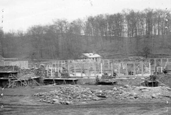 Project #1216 District 4: Completing the construction of Flat Lick Junior High School Building, begun as an F.E.R.A. project. Building will contain 10 rooms and its dimensions are 93' X 128'. Photographed December 12, 1935