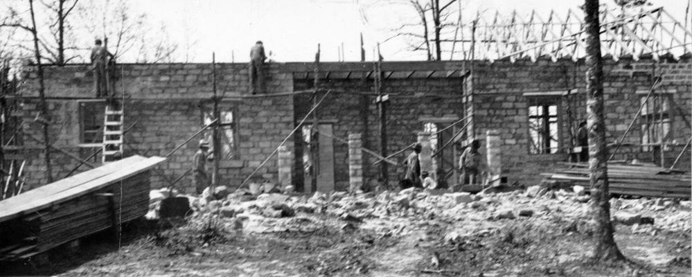 Project #2831 District 2: Native stone school in McCreary County. Construction of a two-room graded school building of native sandstone at Nevelsville, KY. View shows stone work nearing completion. Photographed April 21, 1936