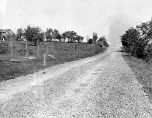 Project #2806 District 2: Project #2806 provides for the repairing and improving of various roads in Garrard County, including the grading, draining and surfacing with crushed limestone the Buena Vista Road for a distance of 5 miles. View of the completed road, photographed September 25, 1936