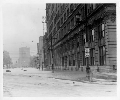 Looking east from Tenth and Broadway in Louisville, KY, January, 1937. The L  &  N Office Building is shown on the right