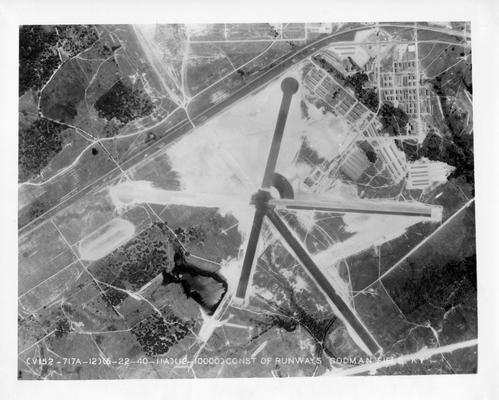 Aerial view of Godman Field at Ft. Knox showing three miles of runways completed by the WPA and three additional miles under construction. In building this airport, the WPA has already moved 1 million cubic yards of dirt and has yet to move 500,000 cubic yards
