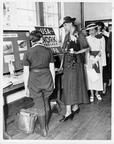 Eleanor Roosevelt visiting the Packhorse Library in West Liberty, KY, May 24, 1937. Mrs. Roosevelt chats with a Pack Horse Librarian of the Kentucky Mountains at the dedication exercises of the West Liberty High School