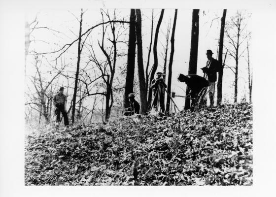 Project #1009 District 6: Topographic survey and mapping of 350 acres at Waverly Hills Sanitorium near Louisville. Field party making survey preliminary to map making. Photographed November 25, 1935