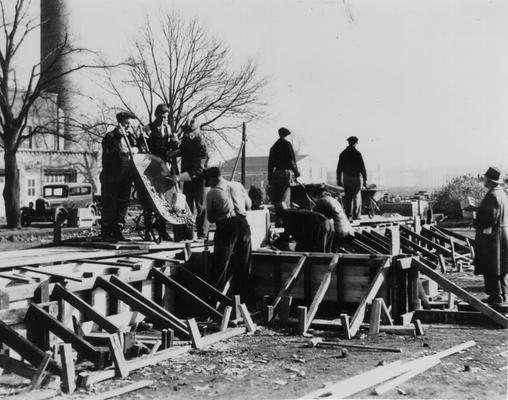Project #481 District 6: Construction of the New Service Building for the University of Louisville. View showing pouring foundations of Service Building, taken from a different angle. Photographed November 24, 1935