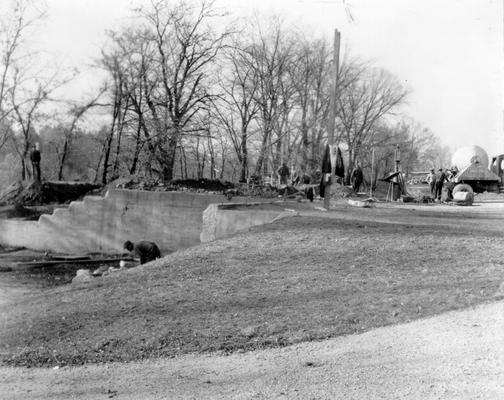 Project #717 District 6: Project includes construction of a new Service Building, excavation and landscaping old quarry,surfacing walks, installation of waterline and completion of three shelter houses on golf course, Seneca Park, Louisville. Seneca Park Caddy House, under construction, showing old foundation which is to be utilized in the new structure. Photographed November 8, 1935