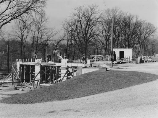 Project #717 District 6: Project includes construction of a new Service Building, excavation and landscaping old quarry, surfacing walks, installation of waterline and completion of three shelter houses on golf course, Seneca Park, Louisville. Seneca Park Caddy House under construction, showing forms for new concrete built in connection with the old foundation. Photographed November 25, 1935