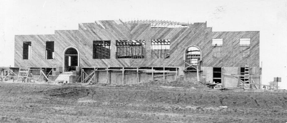 Project #518 District 1: Photograph taken April 8, 1936, shows storm sheathing in place for the new high school building under construction at Cayce, KY. The building will be one-story high and of brick construction. It replaces a frame school structure that was dismantled and the material salvaged as part of the project