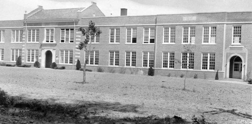 Project #168 District 1: Front view of recenlty completed two-story brick high school building at Heath, KY. This building, constructed under WPA Project #168, contains 21 classrooms, principal's office, gymnasium and shower and dressing rooms. Photograph was taken May 7, 1936
