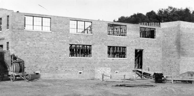 Project #1206 District 2: WPA Project #1206 provides for the construction of an auditorium-gymnasium building, also containing four classrooms for Marrowbone High School in Cumberland County. Photograph, taken May 6, 1936, shows a side view of the new building
