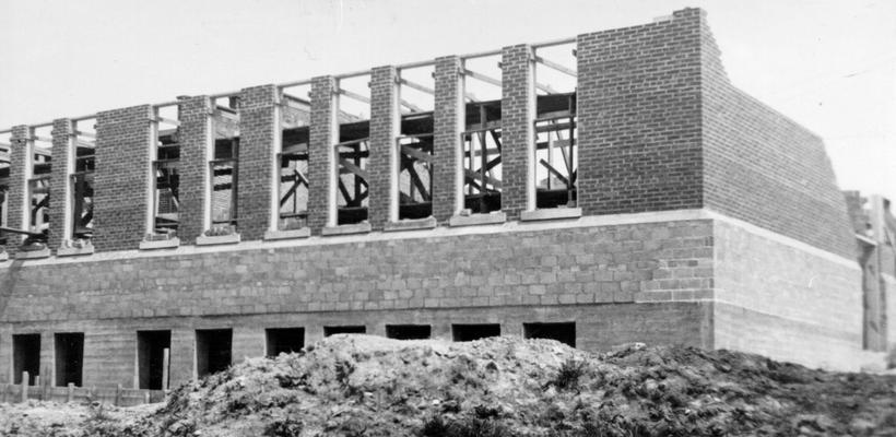 Project #1940 District 2: Construction of a four-room addition to the high school building and the construction of a high school gymnasium building at Columbia, KY. View photographed May 7, 1936, shows the windows of building have been designed for well lighted classrooms