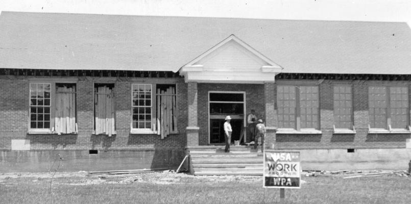 Project #1378 District 6: Nearing completion is the new six-room consolidated school building at Mt. Zion, KY, photographed May 14, 1936. This structure was built under WPA Project #1378. It is of brick veneer construction with asphalt slate roof