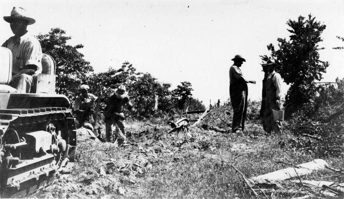 Project #2809 District 2: Reconstruction and repair of three county roads in Larue County. View, photographed June 4, 1936, shows workmen clearing right of way on the Tanner-Maxine Road