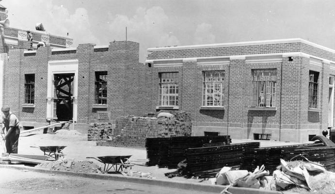 Project #2690 District 6: View, photographed July 9, 1936, of the new right wing of the Bowman Field Administration Building, showing completed brick work