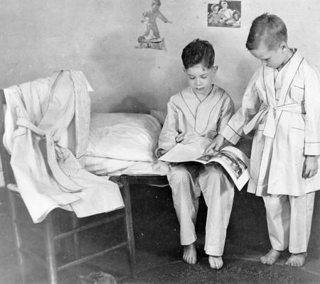 Project #275 District 6: Training Work Center, Louisville, KY. These boys are modeling pajamas and bathrobes made at the Training Work Center. Photograph taken July 29, 1936