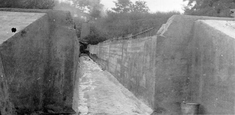 Project #2407 District 3: Project #2407, which is part of Master Project #2813, provides for the construction and installation of a sewer on Washington Avenue, from Fourth Street to the Ohio River in the City of Newport, KY. Washington Street sewer outfall nearing completion. View photographed August 18, 1936