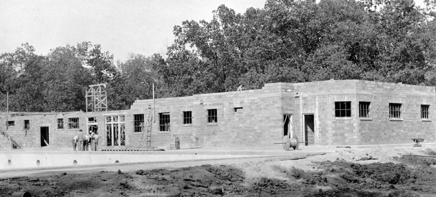 Project #1495 District 1: The construction of a clubhouse in connection with the swimming pool at Noble Park in the City of Paducah. The clubhouse is being built of concrete block made as part of the project. On top of the clubhouse will be a sun deck. Noble Park Clubhouse. The swimming pool was made under another WPA project. View photographed August 19, 1936