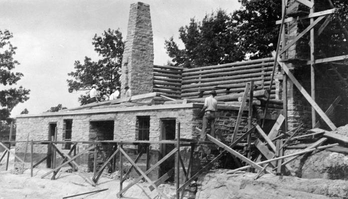 Project #1404 District 2: Construction of a log recreational building with stone masonry foundation, the construction of a concrete swimming pool and other improvements for a public park at Stearns, KY. The community building, showing log construction of the main floor. View photographed June 11, 1936