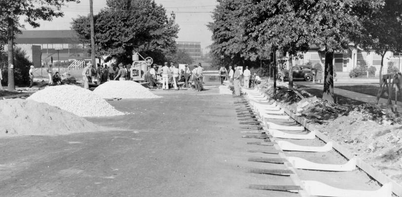 Project #2981 District 6: General improvements to the Park system in Louisville, KY, are being made under Project #2981. Concrete forms for new curb and gutter on the right side of Eastern Parkway facing Floyd Street. View photographed September 6, 1936