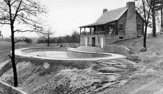 Project #1404 District 2: Construction of a swimming pool, recreational building and other park improvements at Stearns, KY. The completed swimming pool and recreational building at Stearns Park. View photographed January 1, 1937