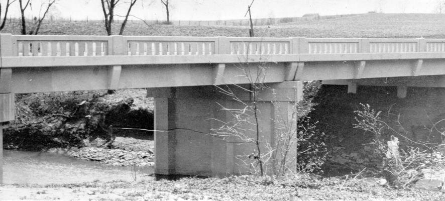 Project #19 District 2: A reinforced concrete bridge was constructed on the Kirkwood Pike in the northwest section of Mercer County. This bridge replaces an old wooden covered bridge in need of repair. The completed Kirkwood Bridge. View photographed April 22, 1936