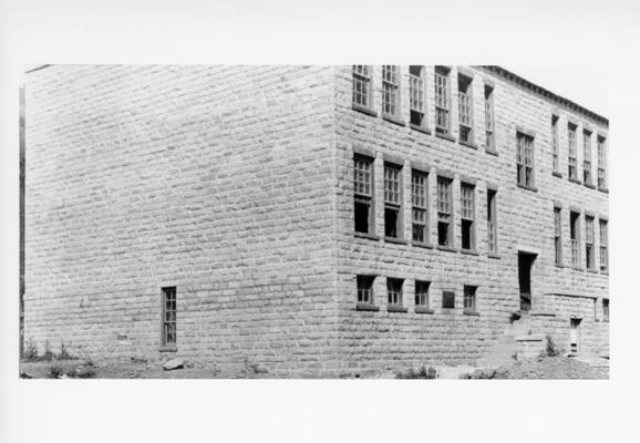 Project #32 District 5: Construction of a 12-room school building of native stone at Sassafras, KY. Completed exterior of the massive Yellow Creek School, photographed September 30, 1936