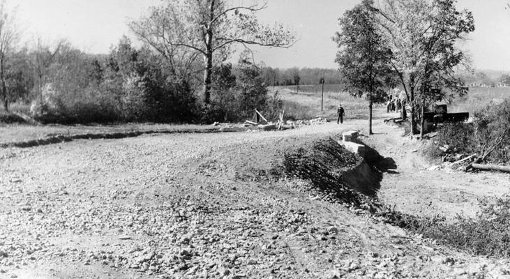 Project #250, Master Project #2784 District 6: Project #250, now a part of Master Project #2784, provided for the reconstruction of 4 miles of the Route Road and the Ferman Road in Jefferson County. View shows construction of a section of the new road necessitated by realignment of the road, photographed October 16, 1935