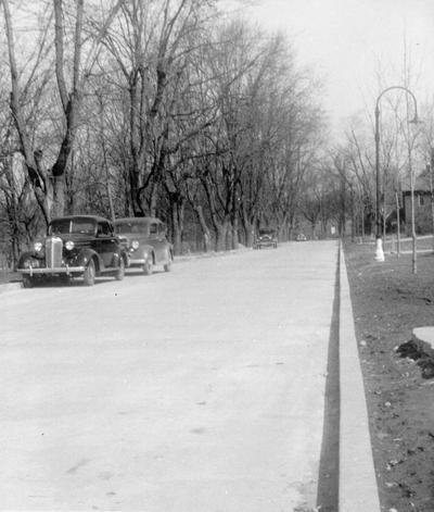 Project #85 District 4: Constructing new pavement on campus at Eastern State Teachers College in Richmond, KY. View of a section of the completed pavement. Photographed February 28, 1936