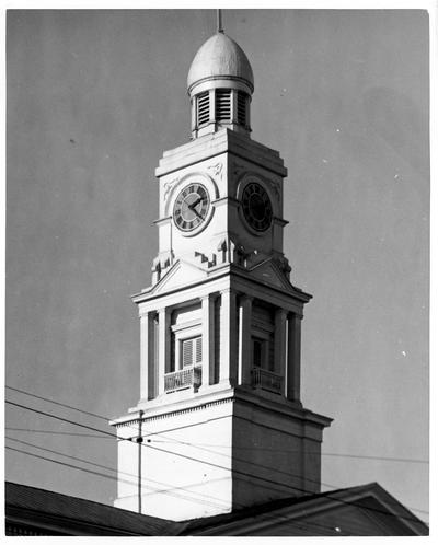 Steeple and clock on unidentified building