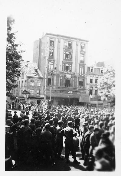 Verviers, Belgium, when WW II ended; May, 1945; crowds celebrating.  This and the following  six photos are signed by PFC. Fred Clark