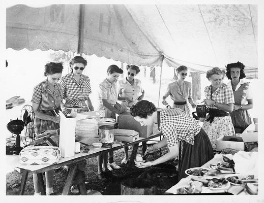 Ladies preparing a picnic table