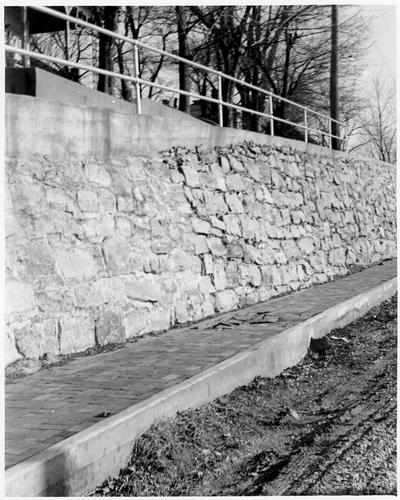 Retaining wall and concrete sidewalk, Eddyville, KY