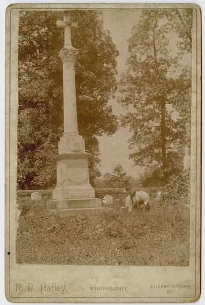 Unidentified woman at John L. Helm's grave