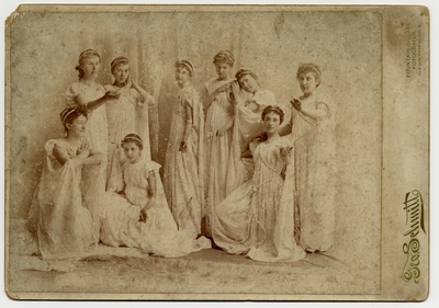 Ladies in Classical Greek dress, Elodie Helm on extreme left, kneeling, Katherine Helm fourth from right