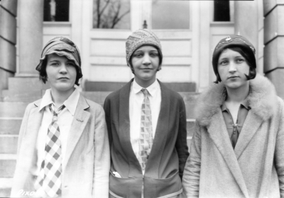 Unidentified individuals from a city named Dixon High School (location unknown but probably Kentucky) visiting the University, standing in front of Miller Hall