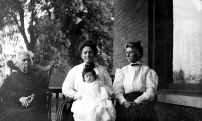 Women on porch, possibly four generations