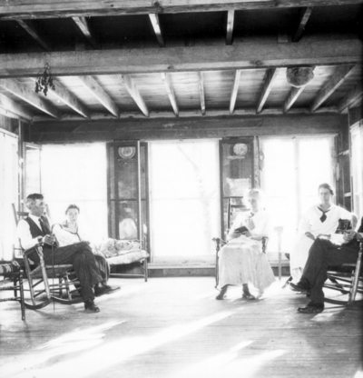 Family reclining in rocking chairs