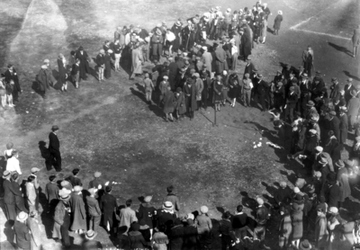 Group gathered in a field, aerial view