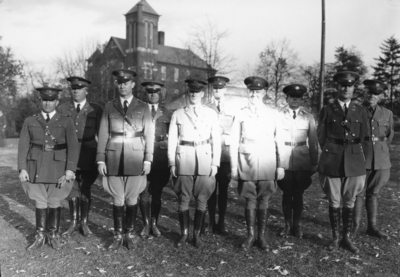 Military officers, Barker Hall in the background