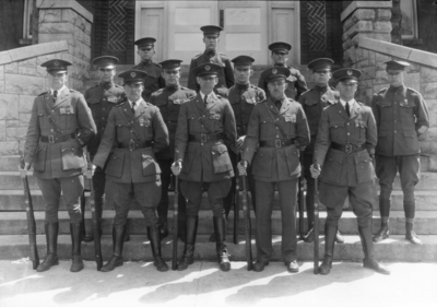 Military unit of men with rifles