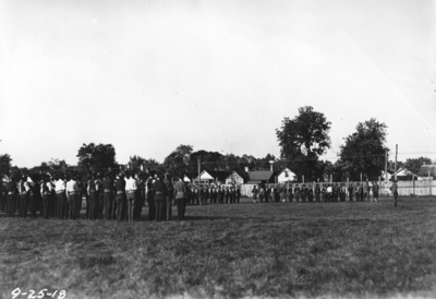 Men in formation with rifles